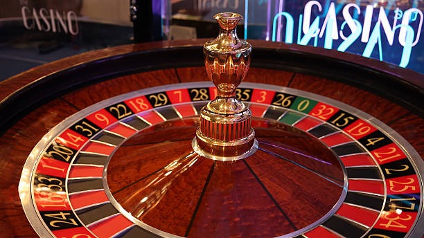 bentengtogel link live casino table with multiple players and dealer
